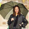 Person with pocket umbrella in detail Person with pocket umbrella in detail