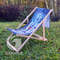 All-over printed deckchair with flag